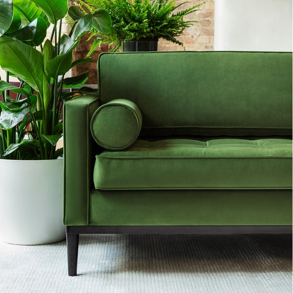 green velvet sofa