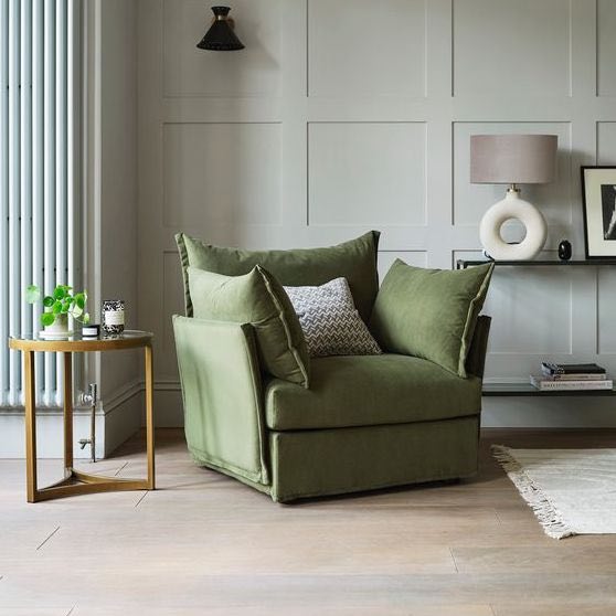 green armchair with side table