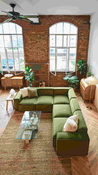 Modular green velvet sofa