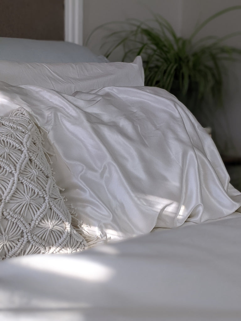 Luxury bed linens draped