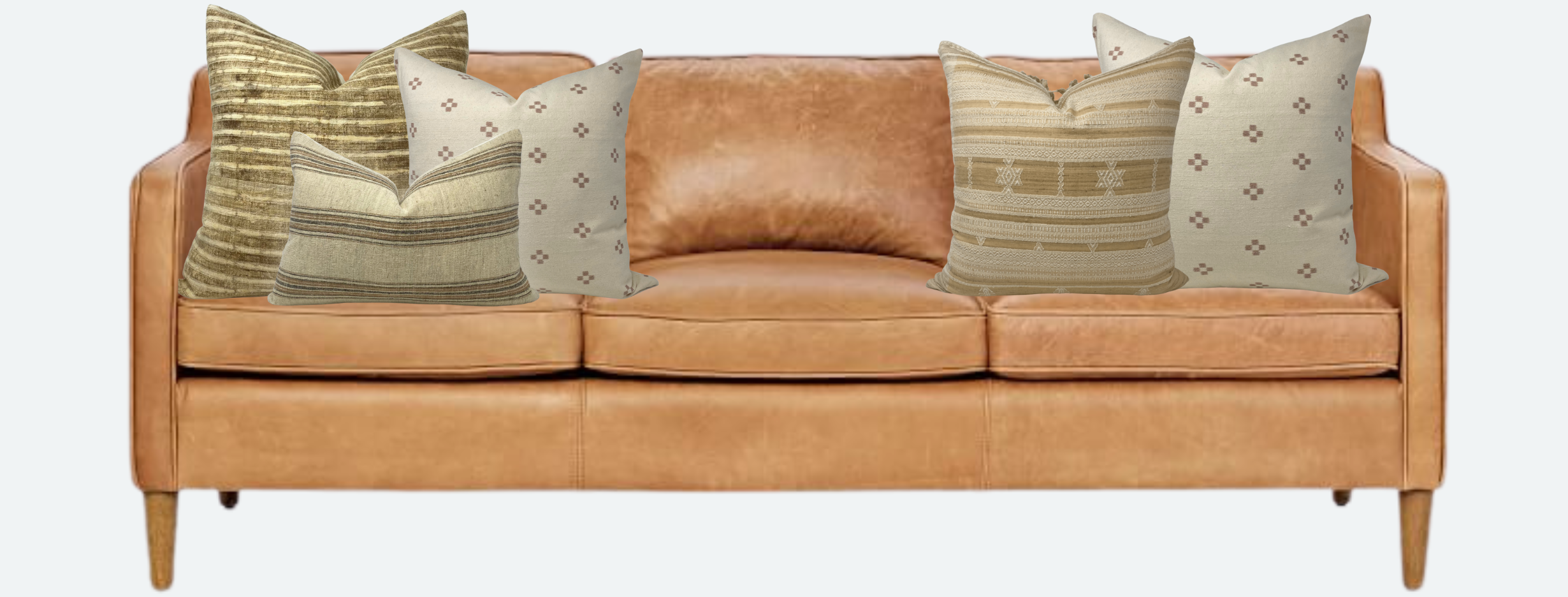 https://cdn.shopify.com/s/files/1/0052/8780/5039/files/Everand_Beige_tones_camel_leather_couch.png?v=1661447420