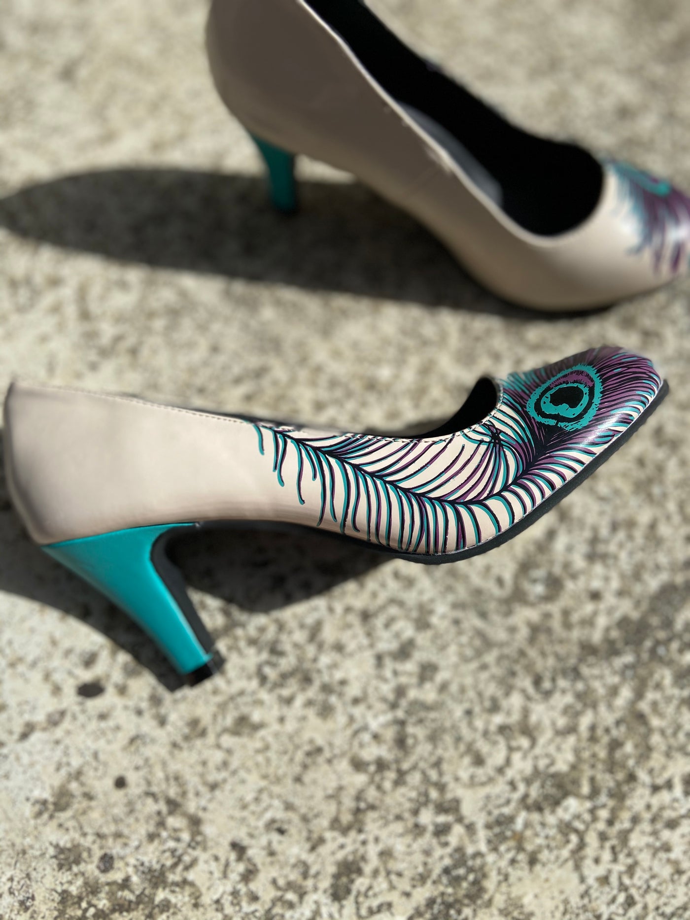 tuk peacock heels