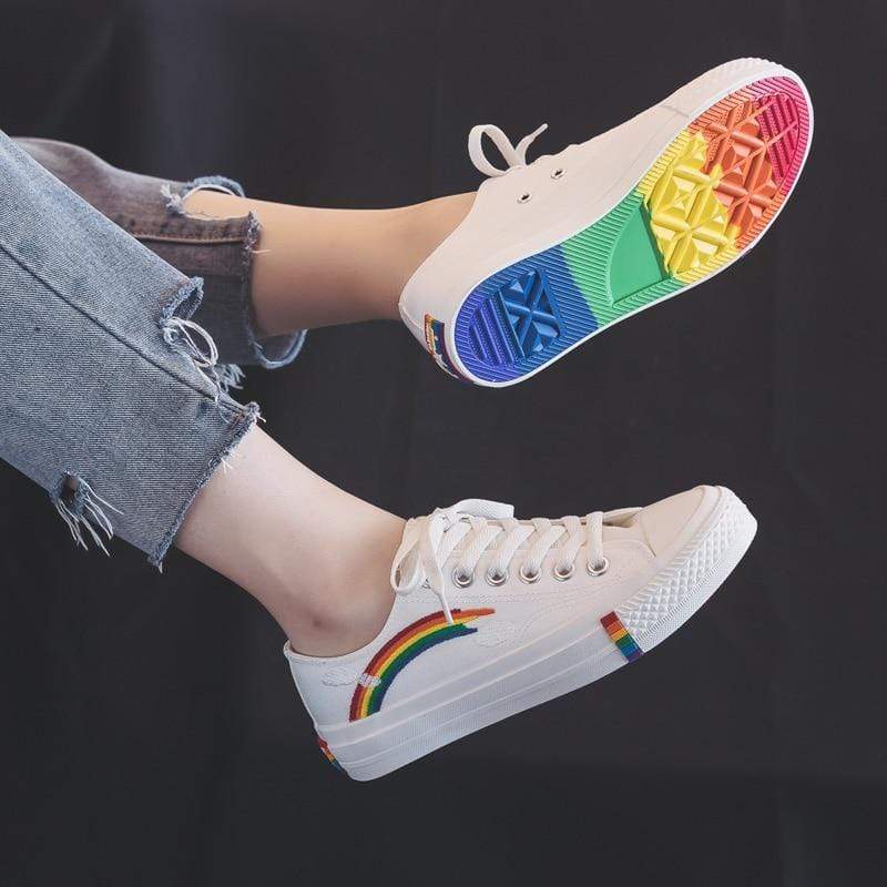 white sneakers with rainbow