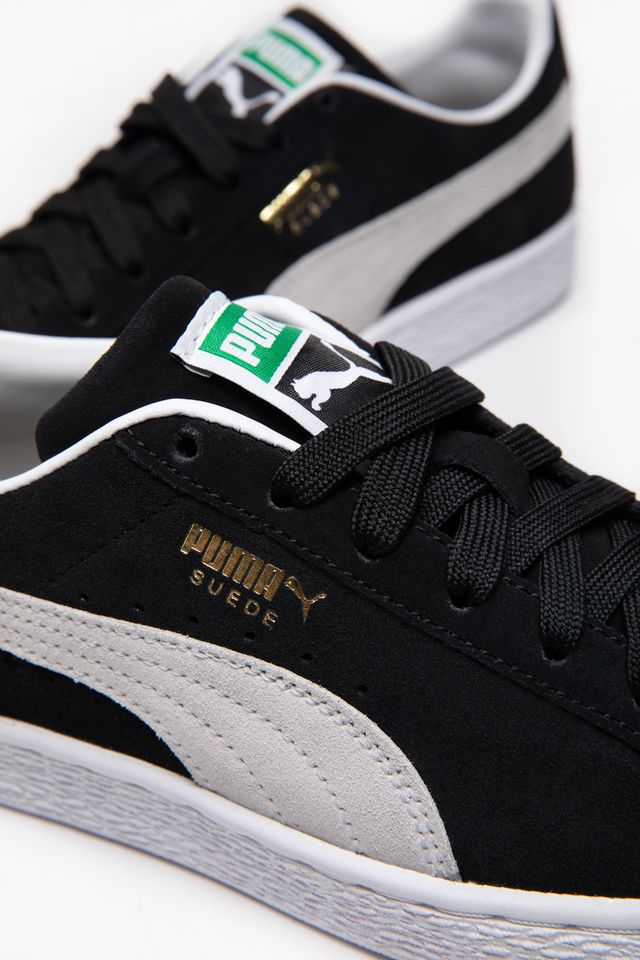 black pumas with white stripe