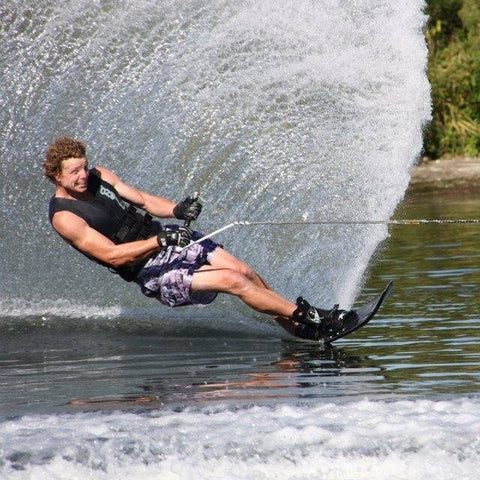 David Green wakeboarding on a lake