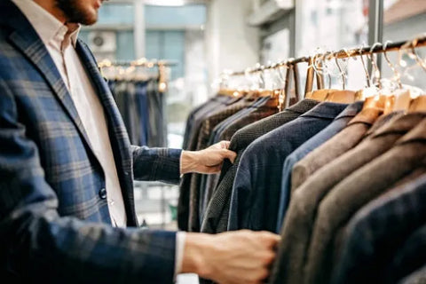 A man selecting a business attire