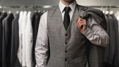 a business man on a charcoal suit