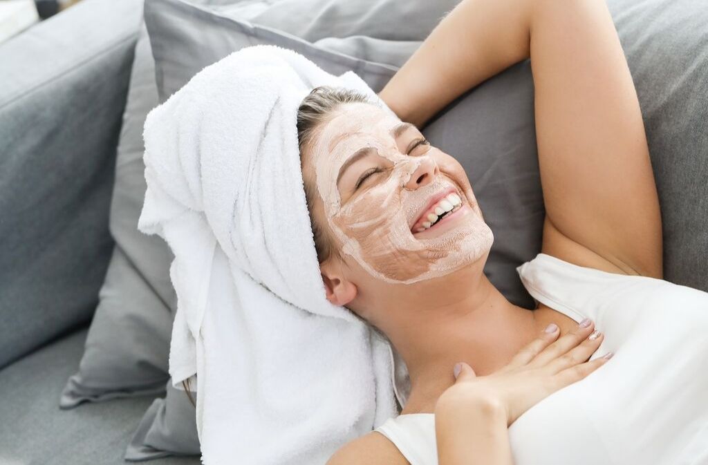 woman relaxing with collagen facial beauty treatment