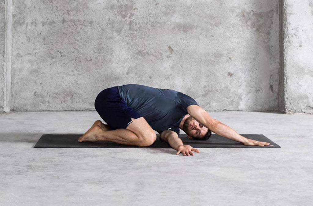 man in yoga pose