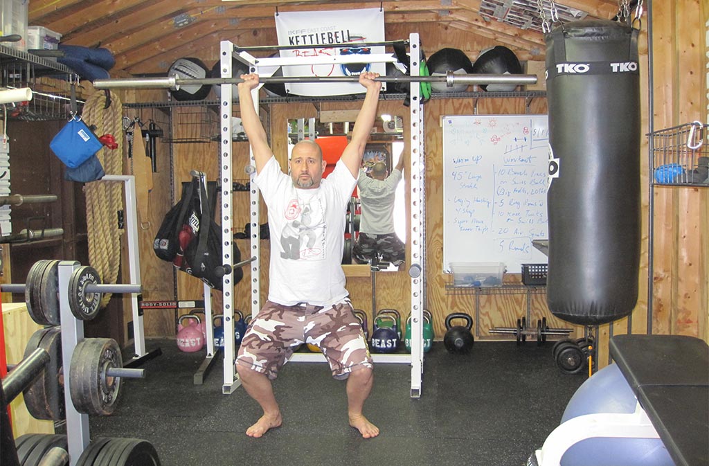 man at bottom of push jerk