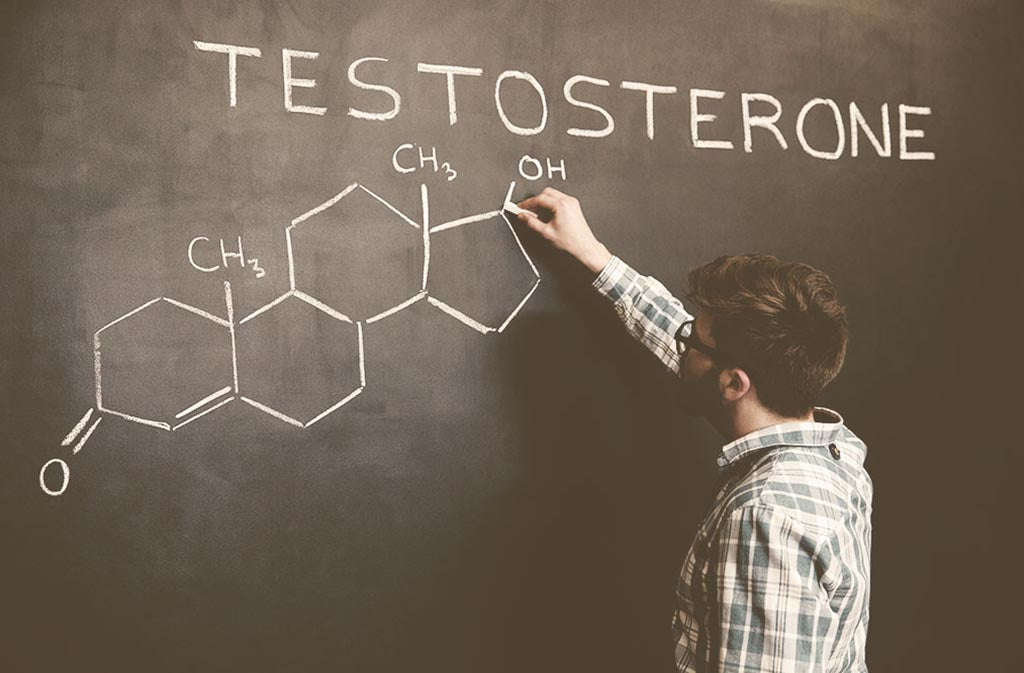 man writing testosterone on a chalkboard
