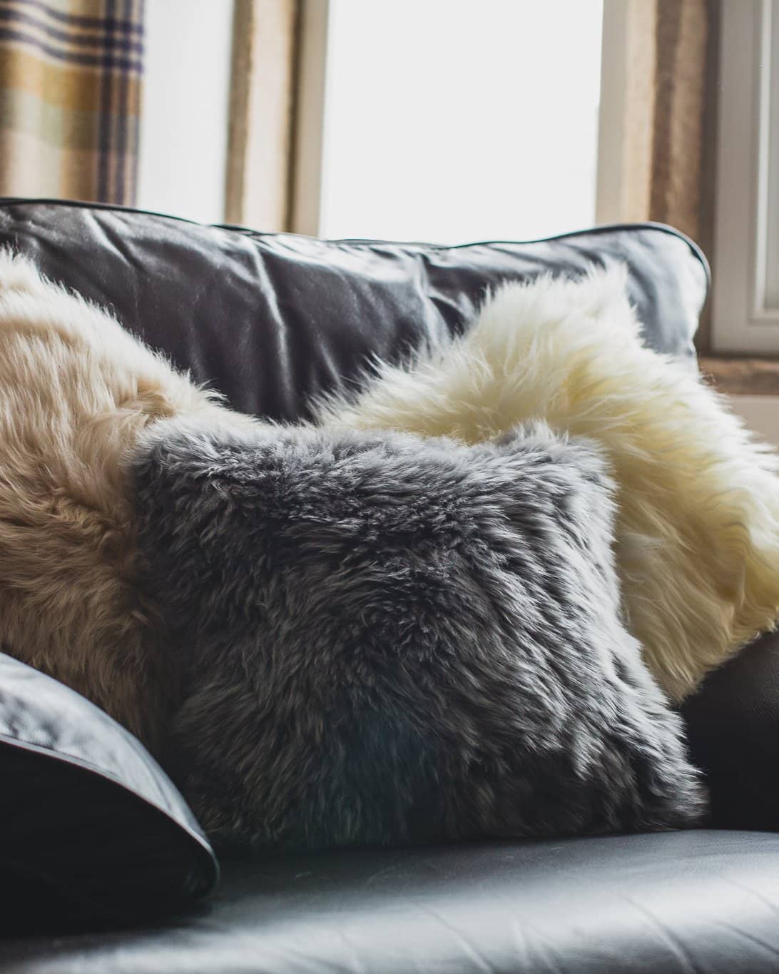 Buy a Charcoal Grey Sheepskin Pouffe Online at Nordic Sheepskin