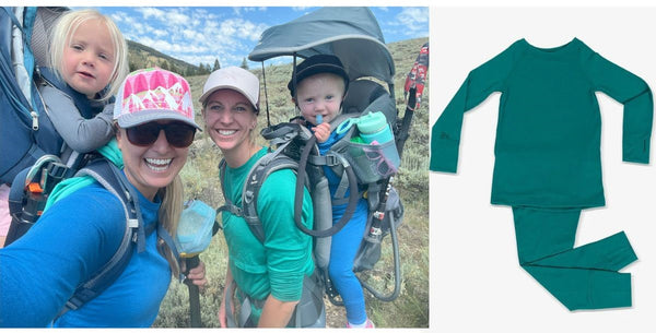 The owners of Iksplor hiking with their kids next to the Merino Wool base layers they created
