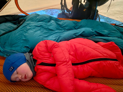 Baby sleeping in the tent