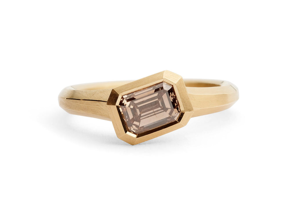 Rose gold and emerald-cut cognac diamond engagement ring