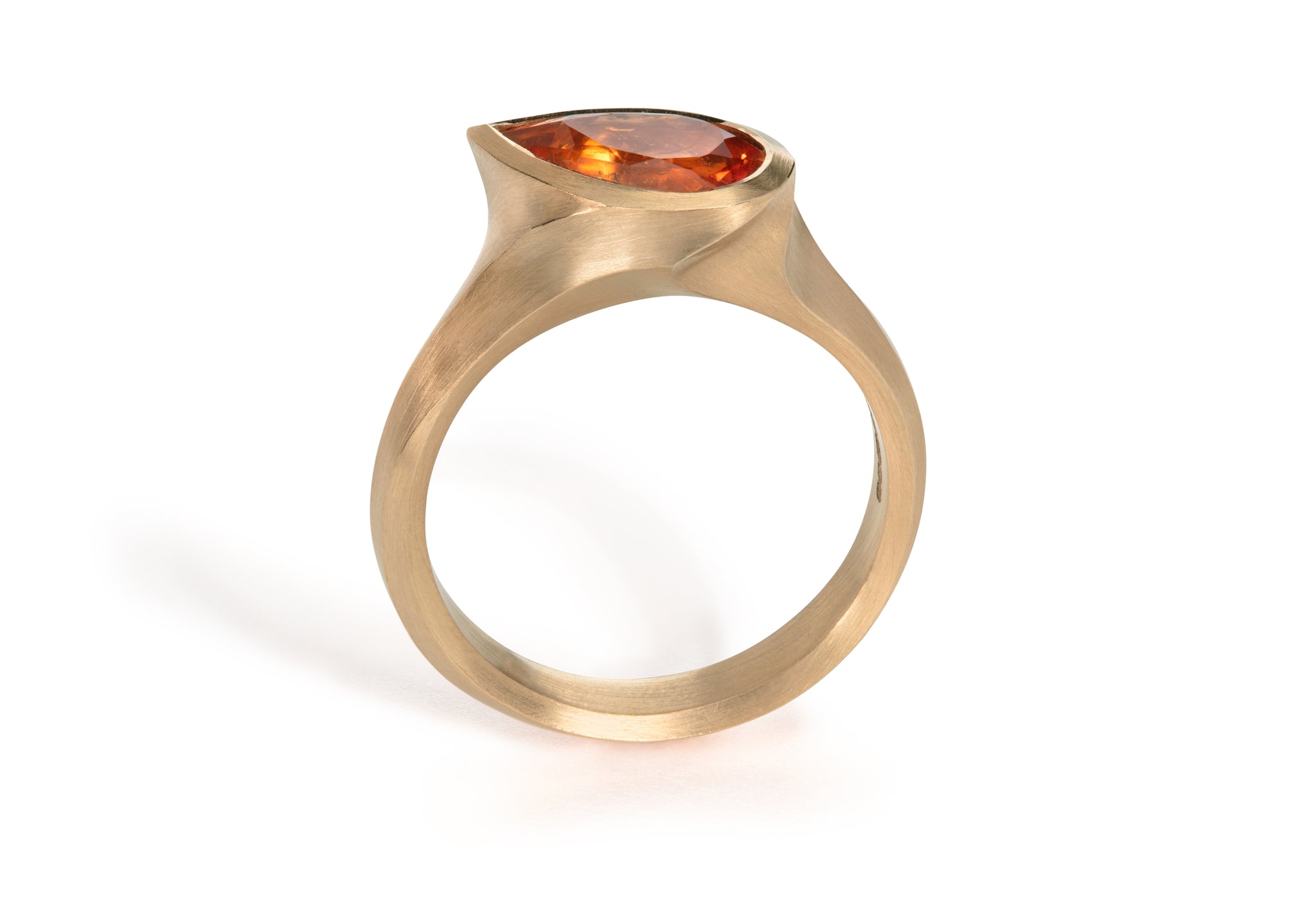 Rose gold and pear shape mandarin garnet ring.