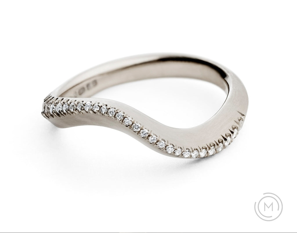 Carved white gold and diamond engagement and wedding ring in one