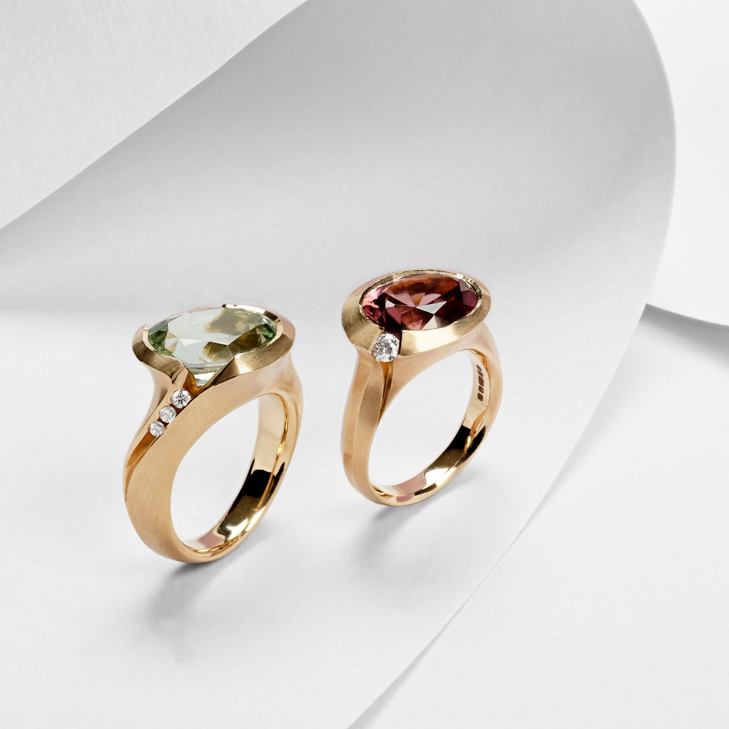 Tourmaline and zircon and diamond arris rings in 18ct gold
