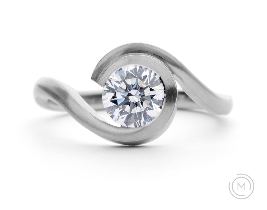 Brushed platinum and round white diamond contemporary engagement ring