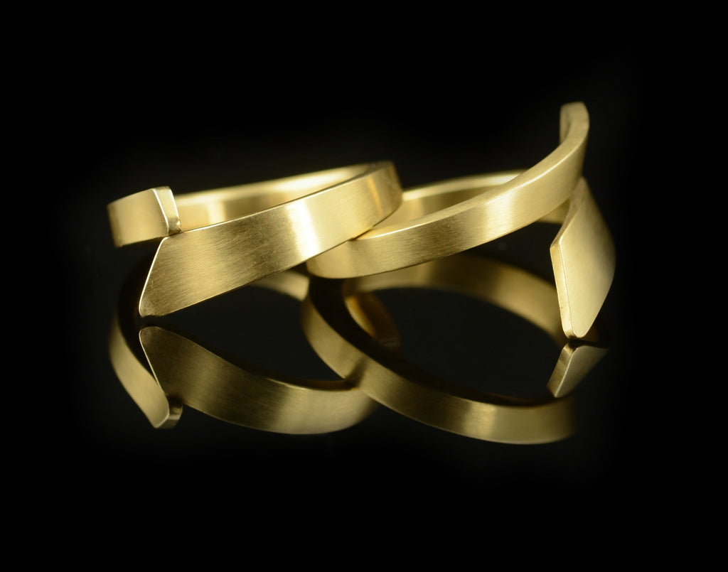 Hand-forged yellow gold alternative wedding rings