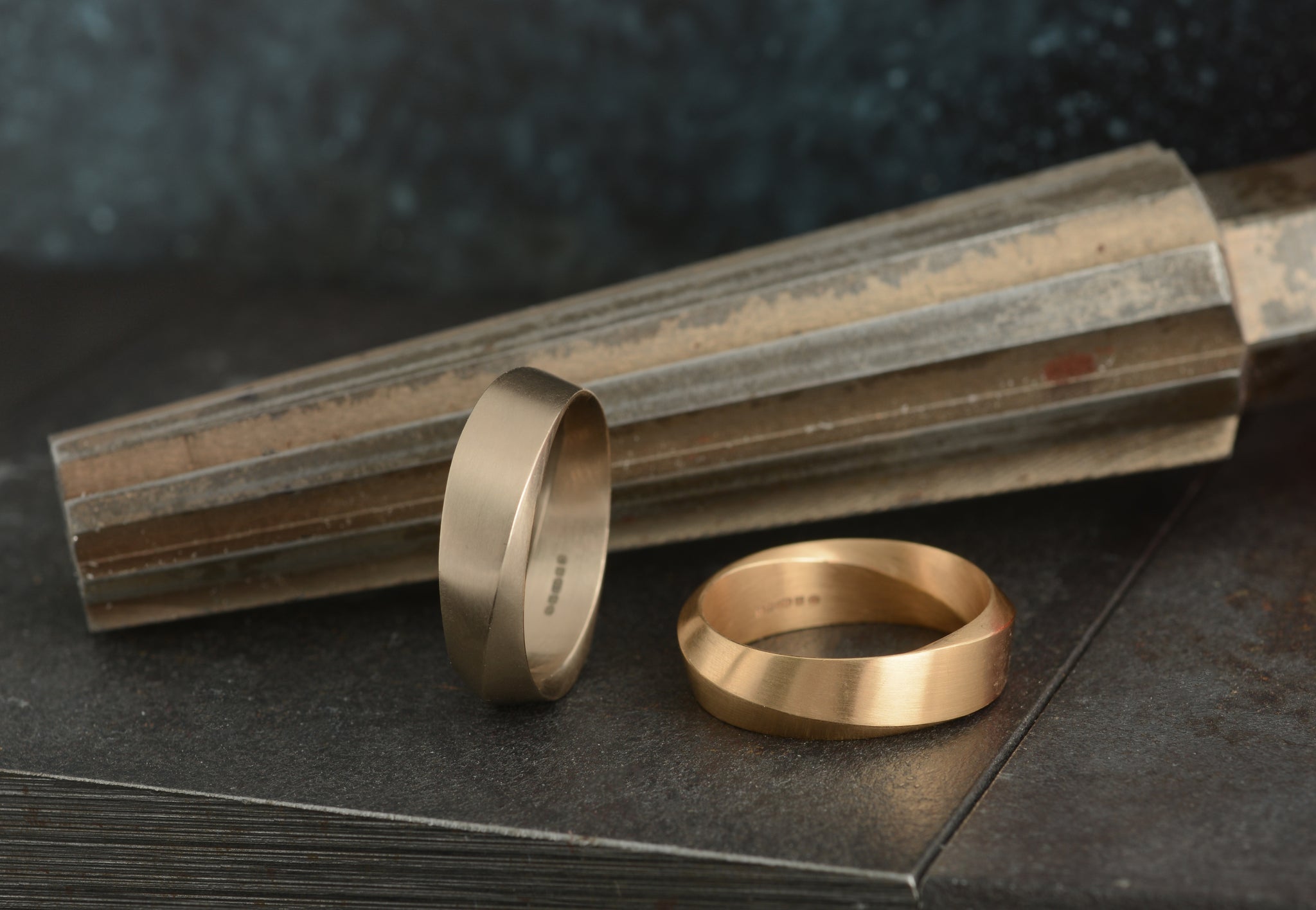 Rose gold and white gold mobius wedding rings.