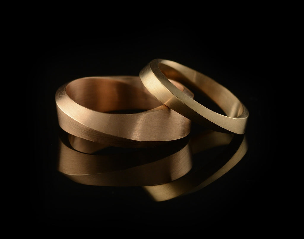 'Mobius' hand-carved rose gold mens wedding rings