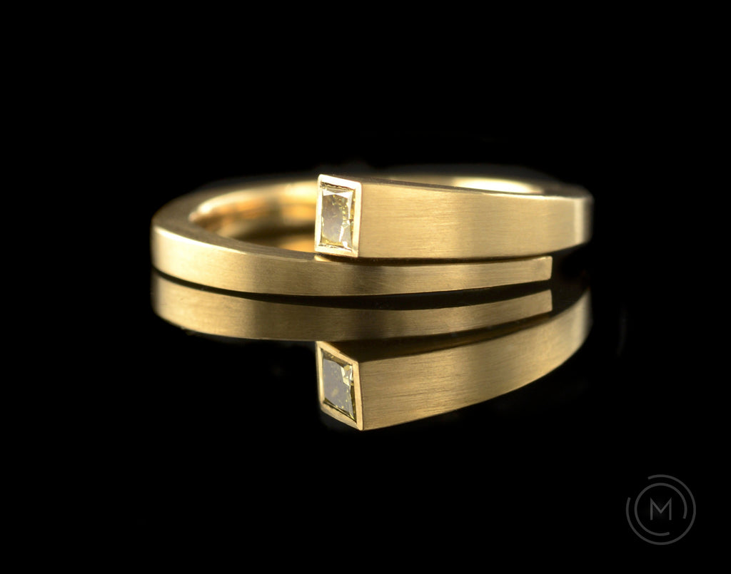 'Overlap' modern engagement ring in yellow gold with princess white diamond 