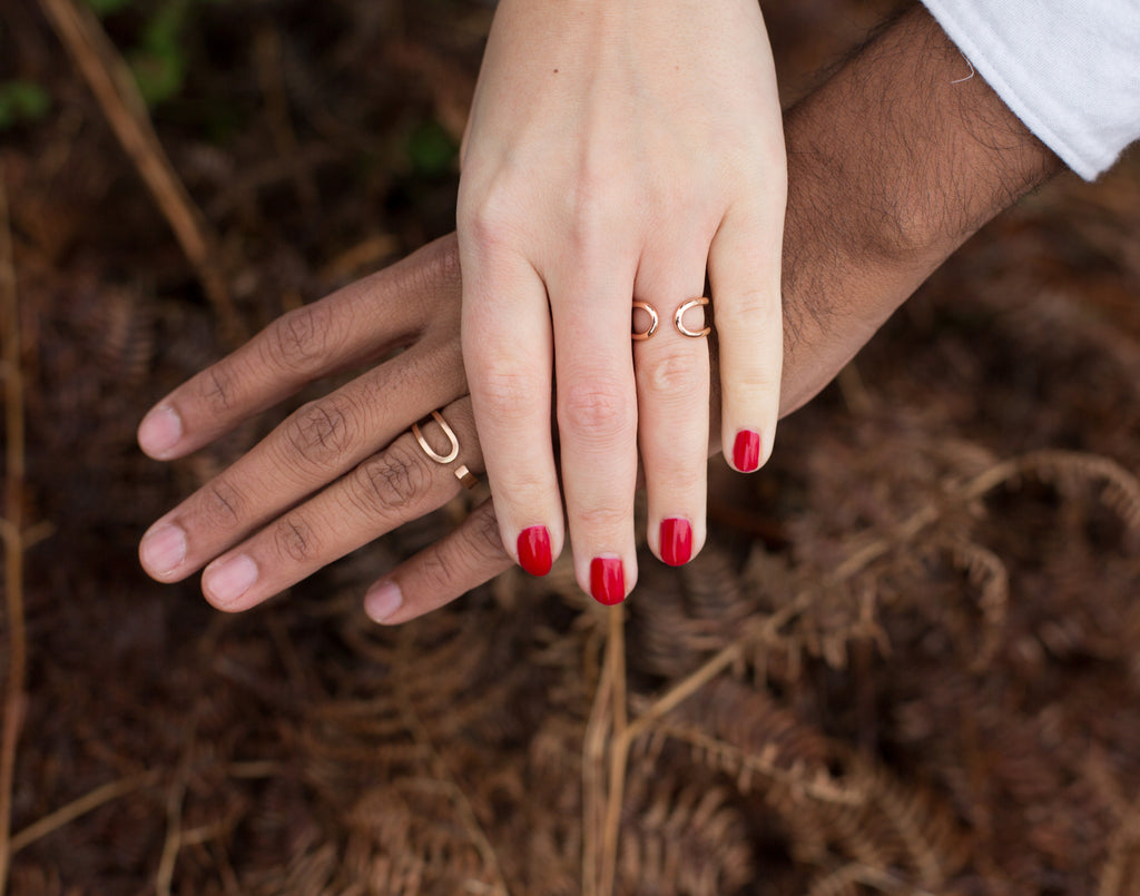 His and hers bespoke rose gold all-in-one wedding rings 