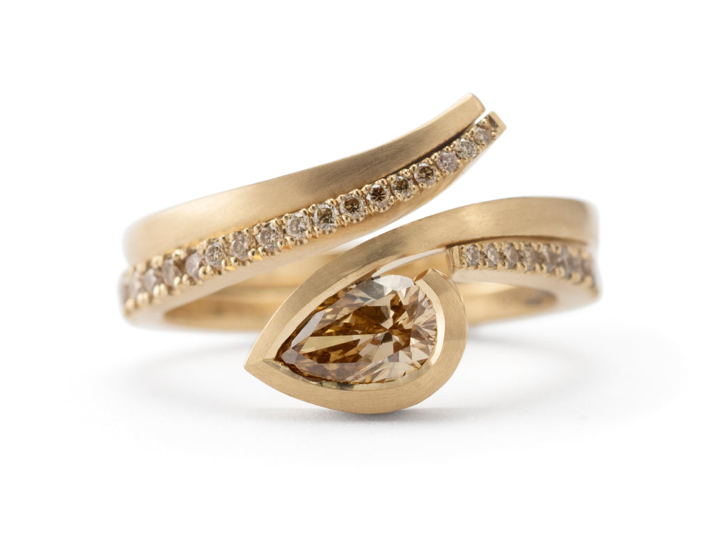 'Twist' gold engagement ring with pear cognac diamond