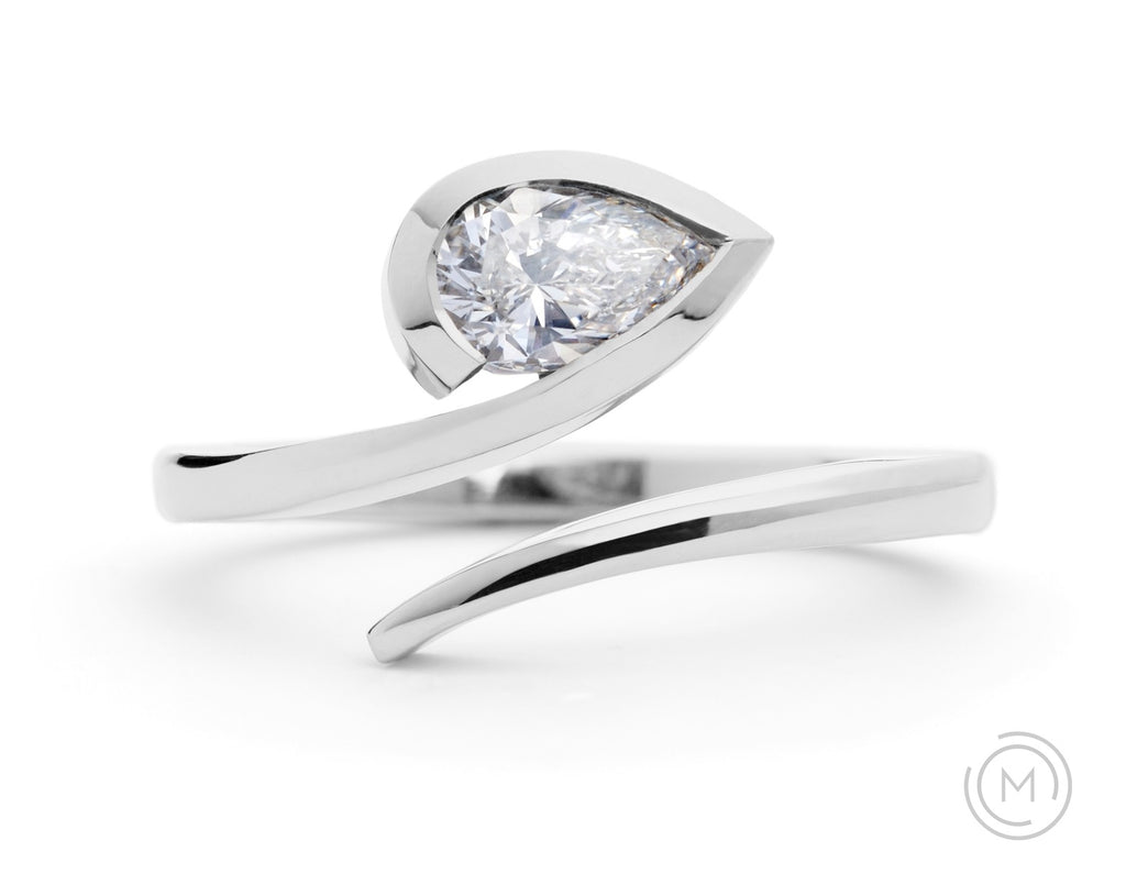 'Twist' modern platinum engagement ring with pear white diamond