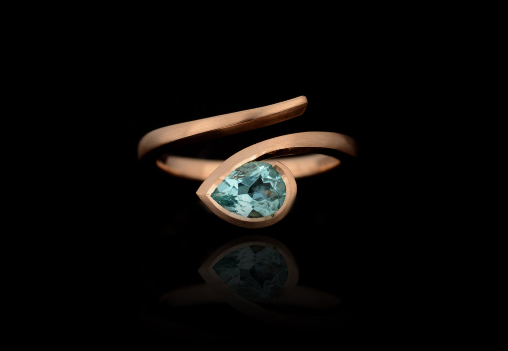 Paraiba Tourmaline pear shape twist rose gold engagement ring