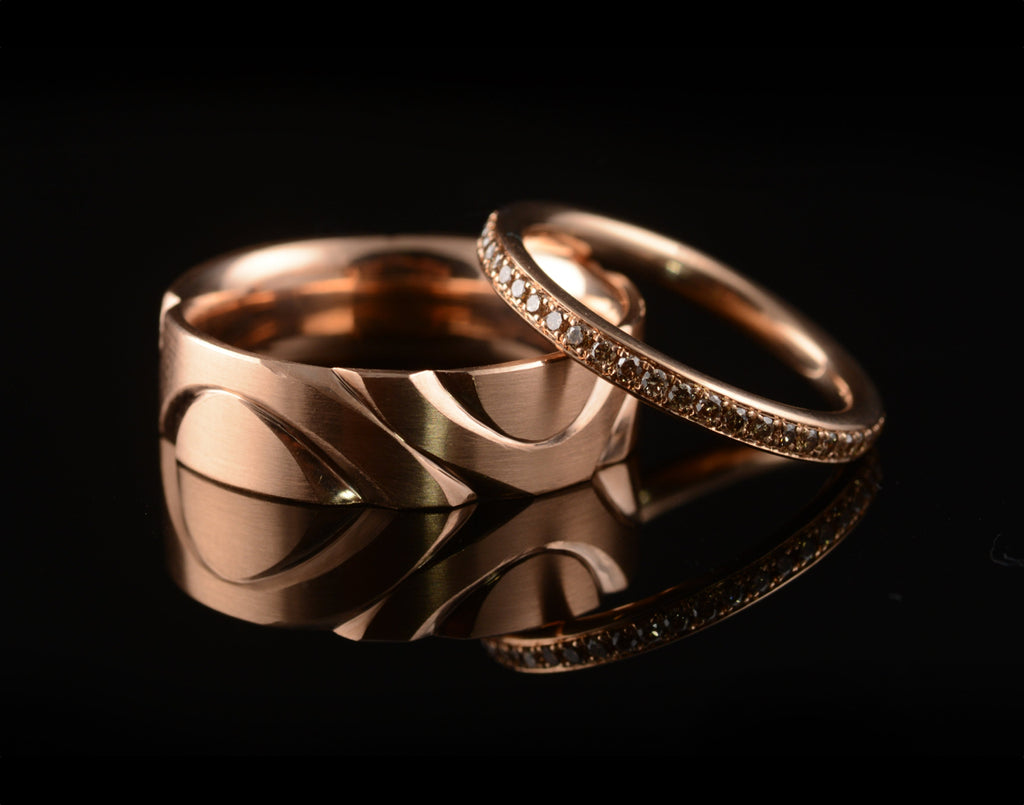 Bespoke carved rose gold men's wedding ring with ladies' diamond ring