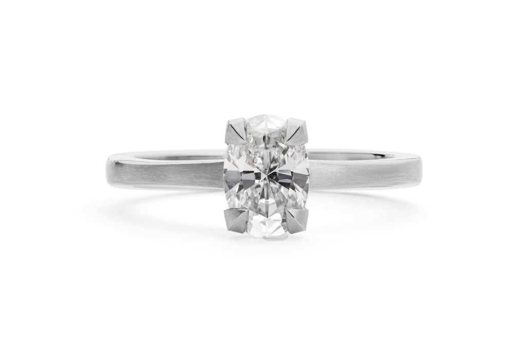 White diamond platinum 4 claw engagement ring