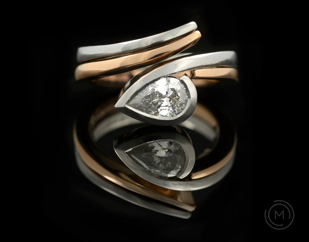 Contrasting rose and platinum fitted wedding and engagement rings