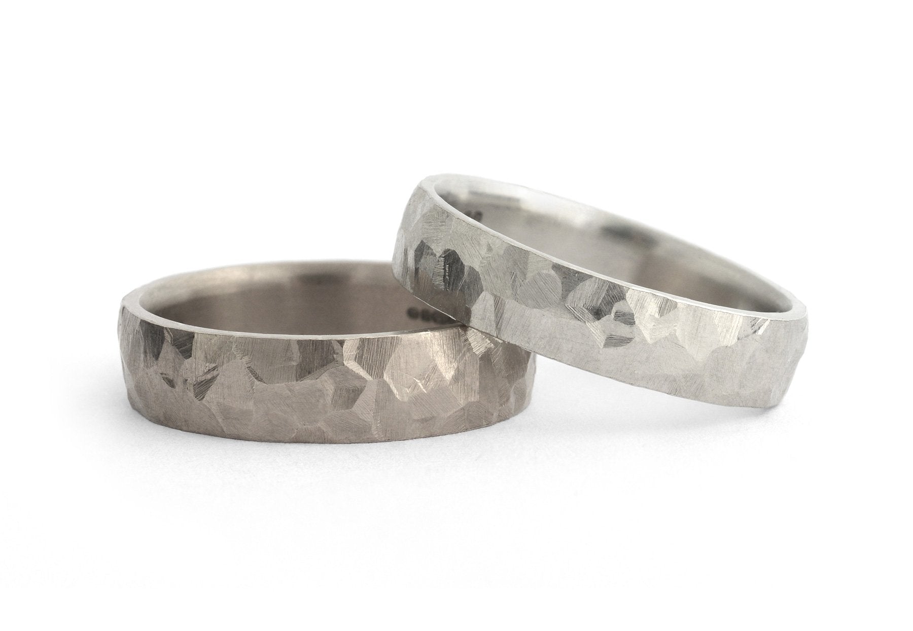 Hammered men's wedding bands in 18 carat white gold and platinum