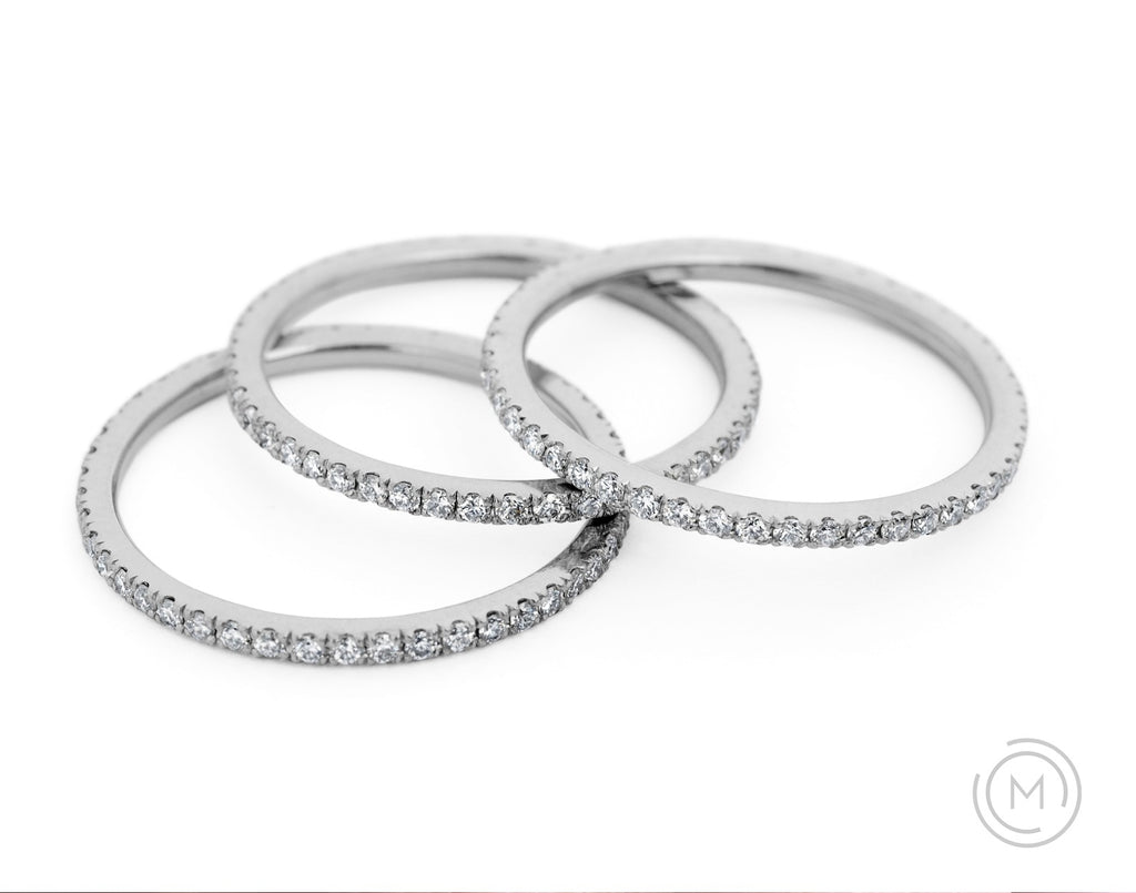 Minimal fine diamond and platinum wedding bands