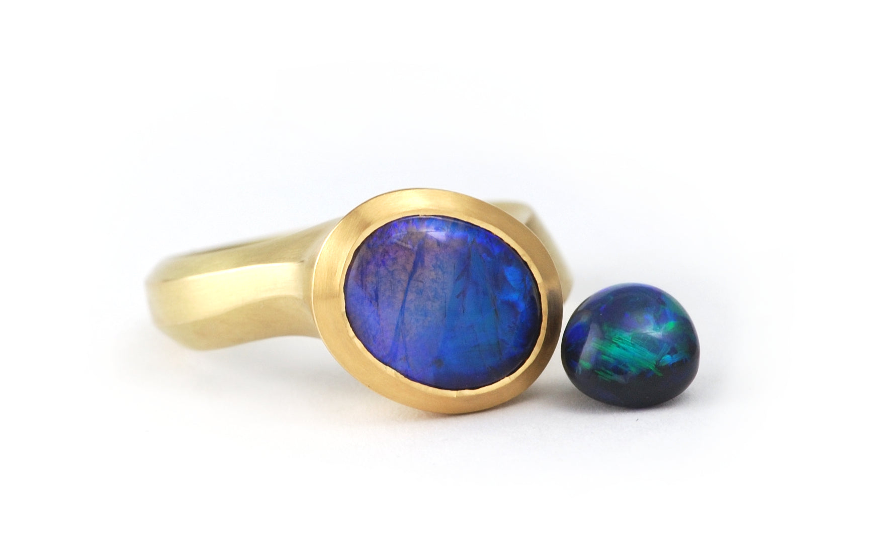 18 carat yellow gold ring set with black opal