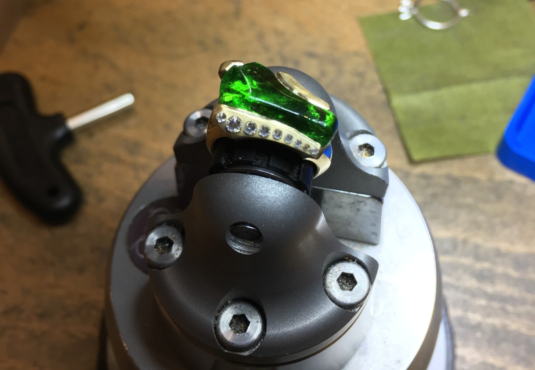 18 carat gold ring being set with sea glass and diamonds