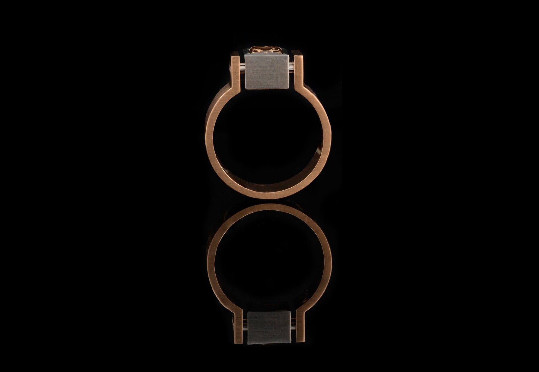 Architects angular riveted engagement ring with cognac diamond