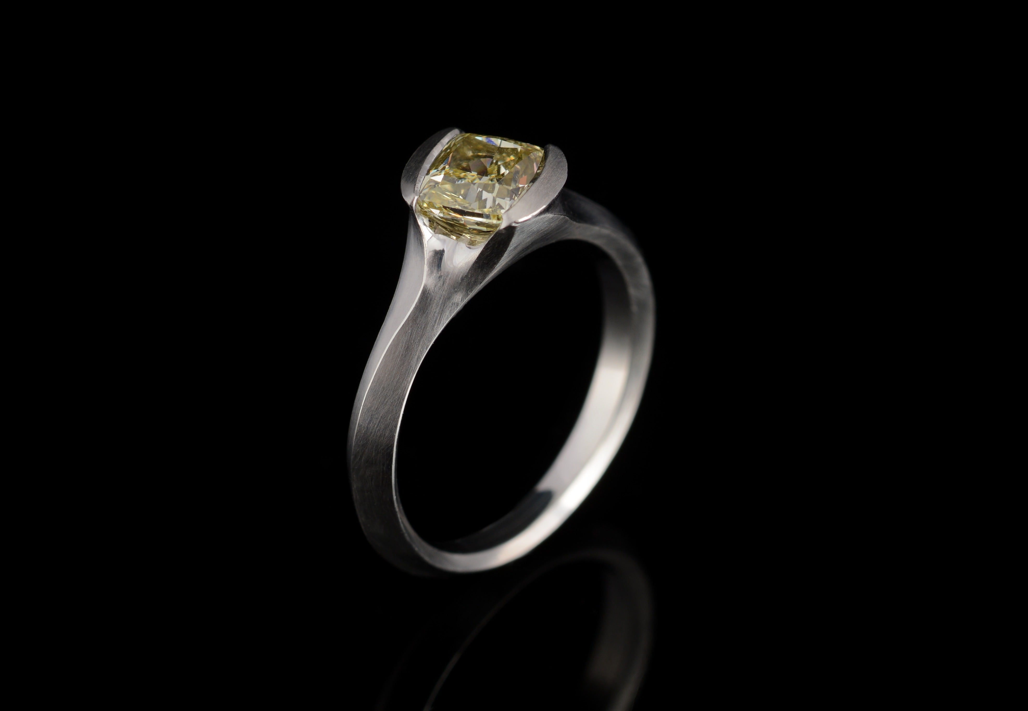 Arris cushion cut yellow diamond and platinum engagement ring