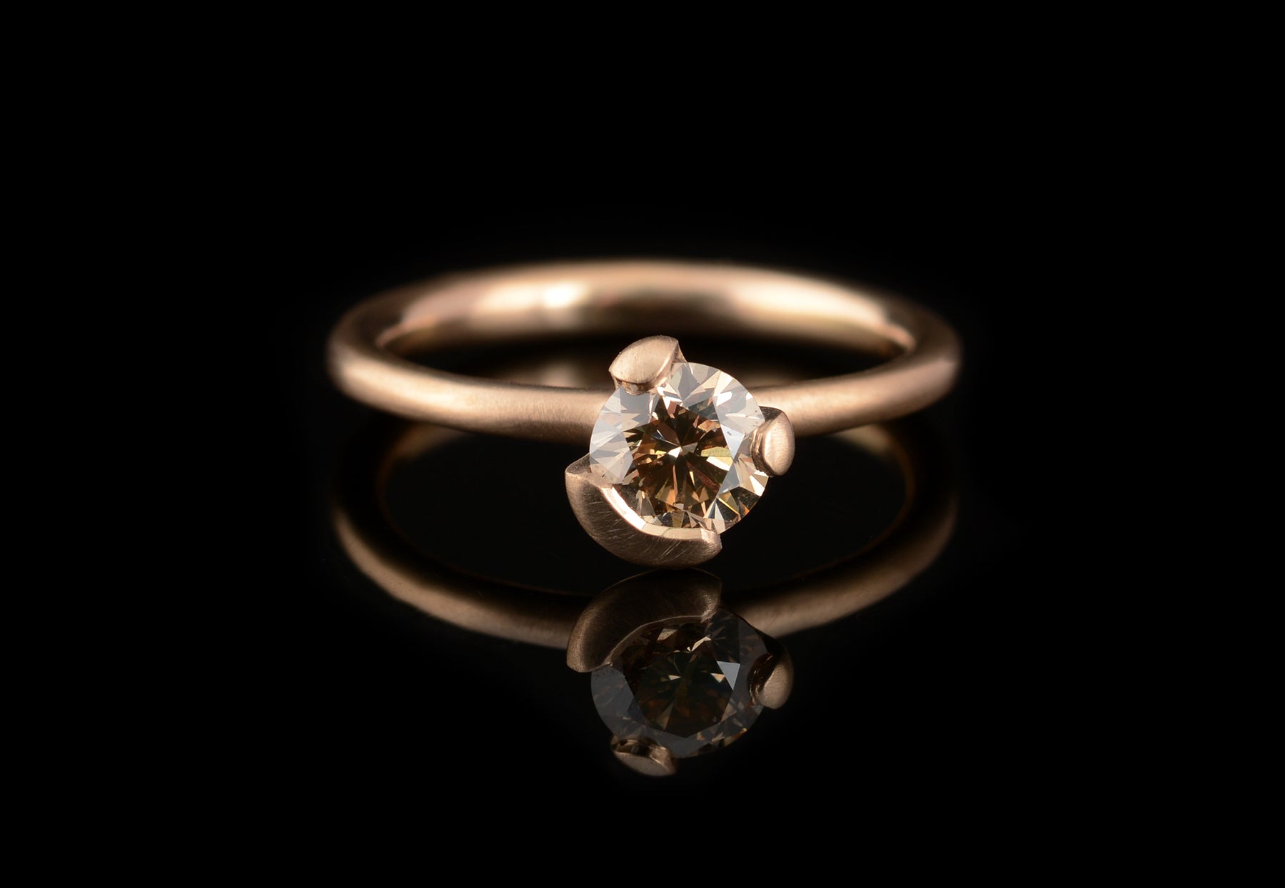 Cognac diamond 18-carat rose gold asymmetric claw engagement ring 