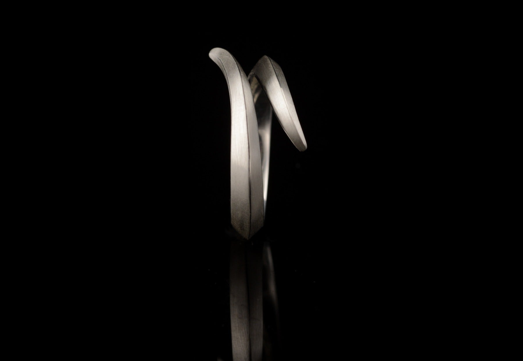 Bespoke twist-shaped wedding band commission