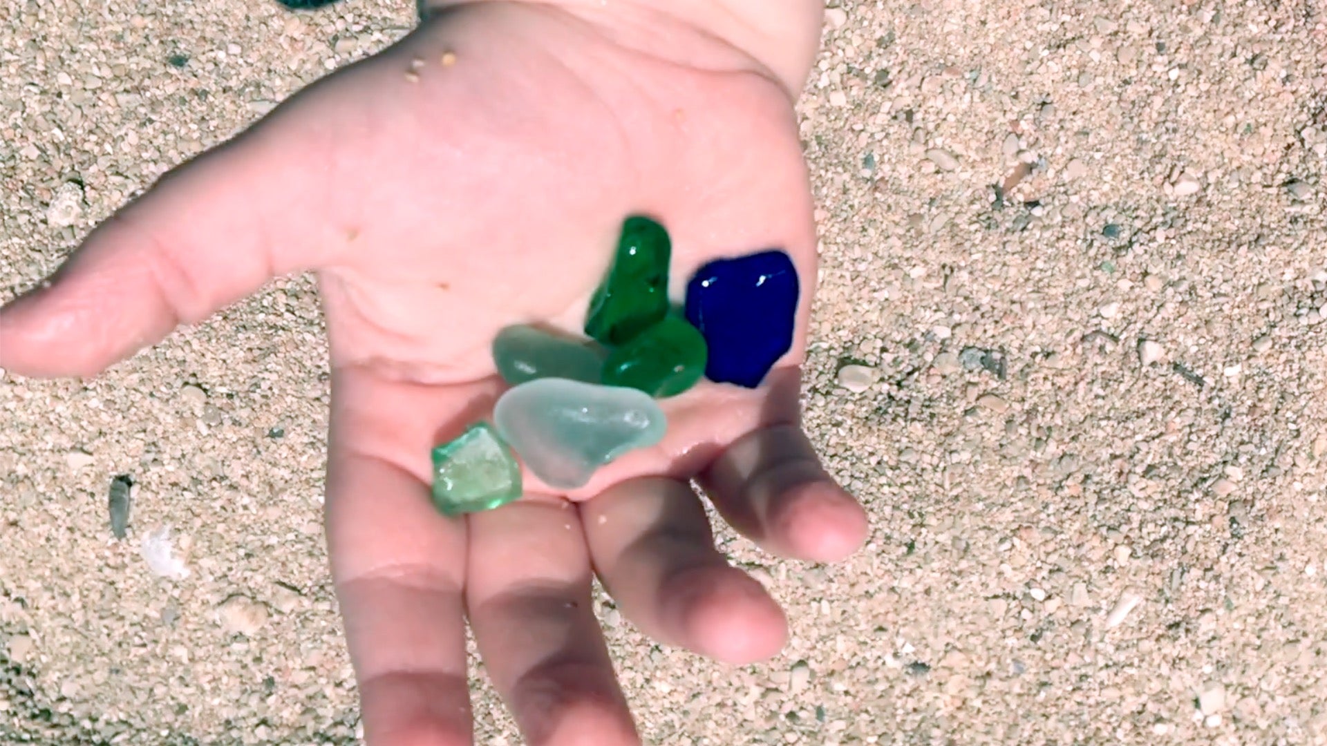 Cora holding sea-glass