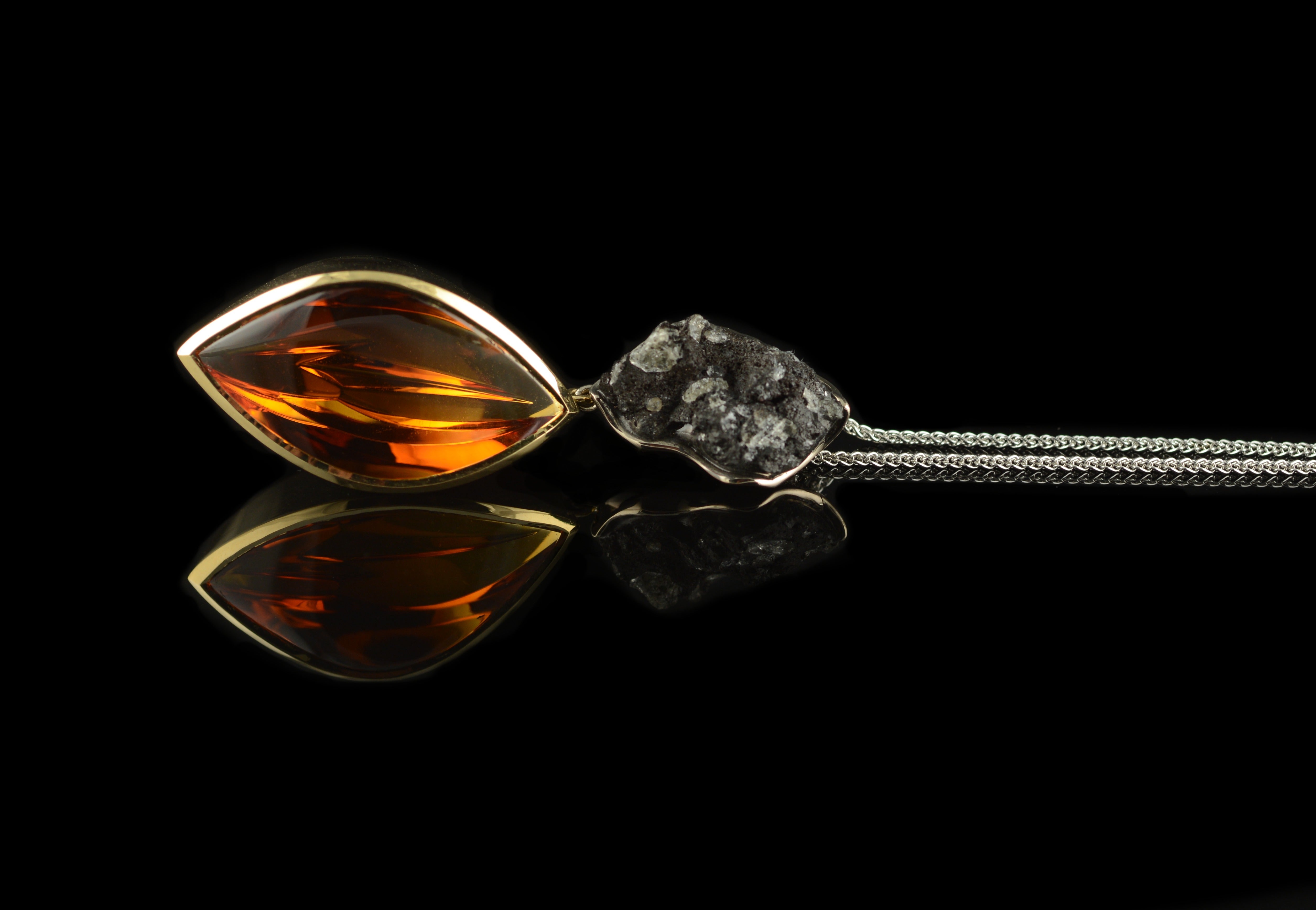 Yellow and white gold pendant set with lava and citrine