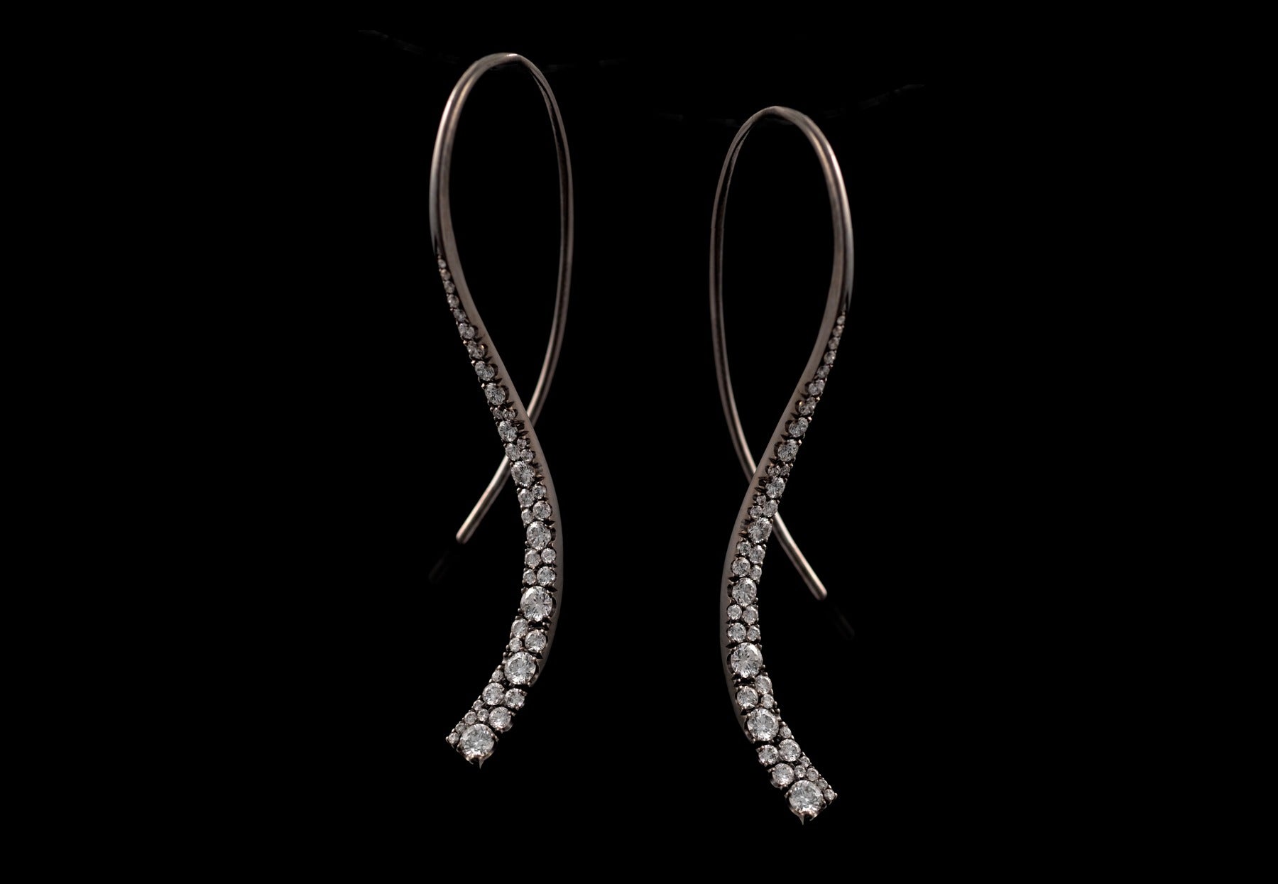Black rhodium drop earrings with randomly set diamond
