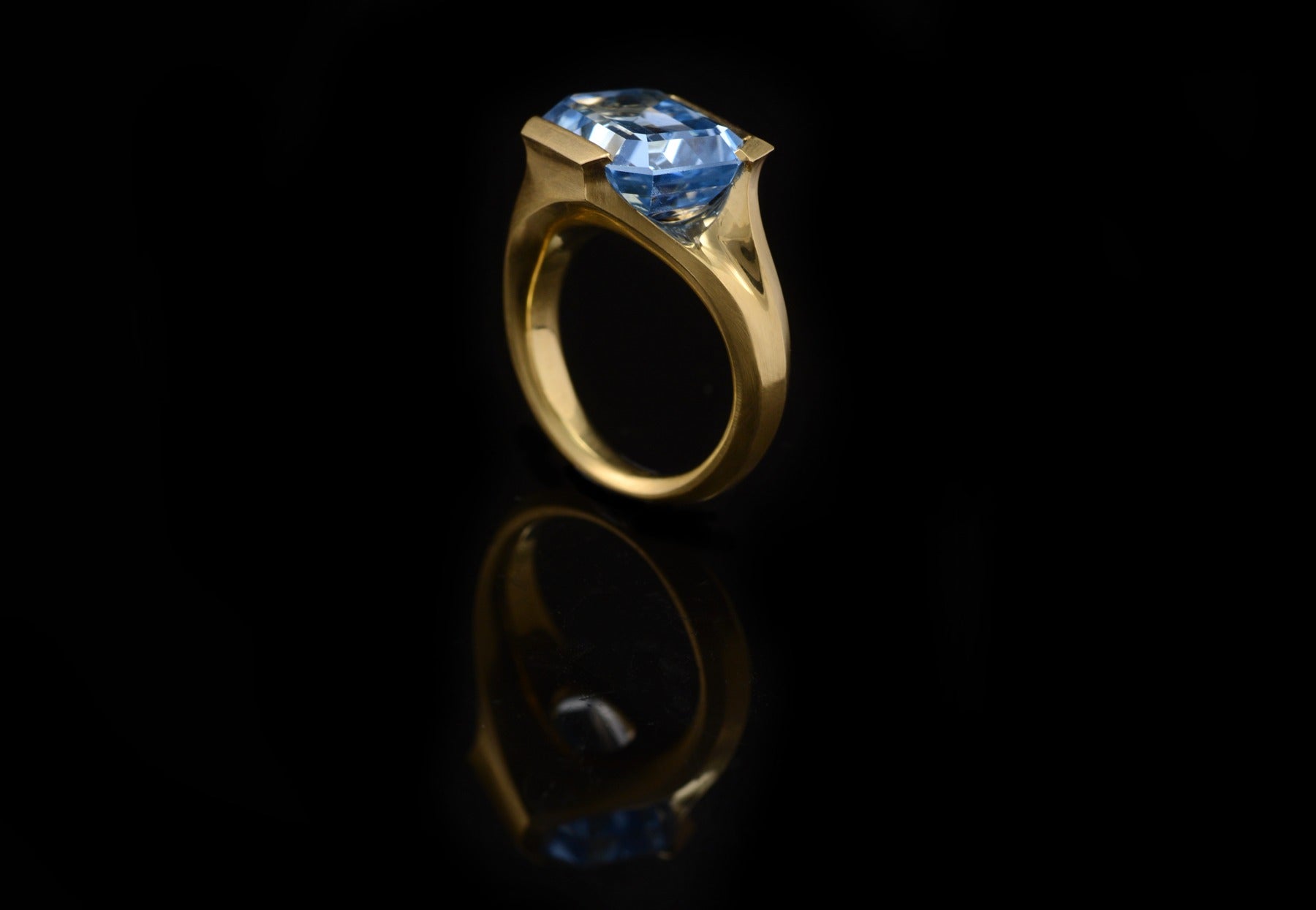 Hand carved gold ring with rectangular stone