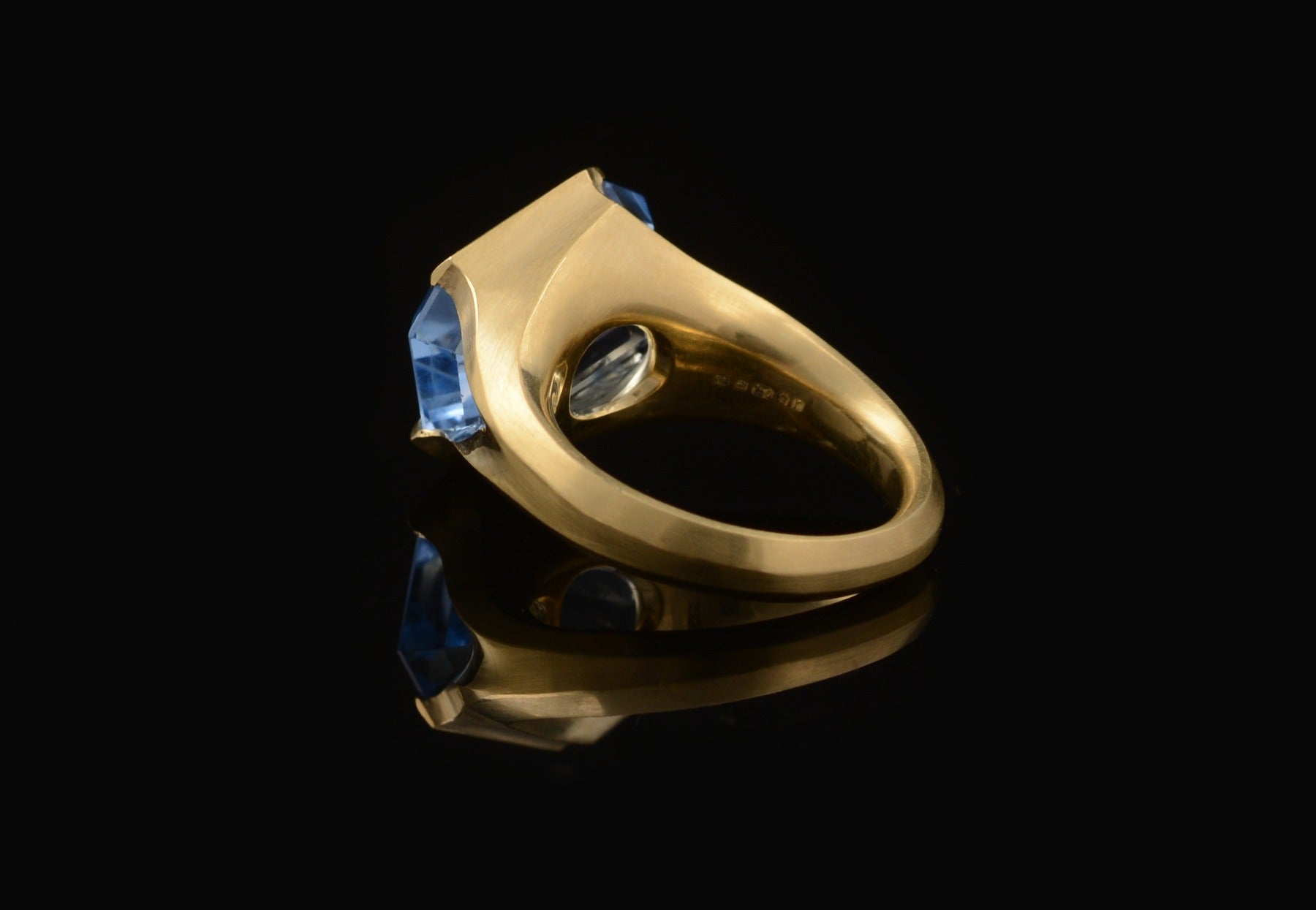 Hand carved gold ring with rectangular stone