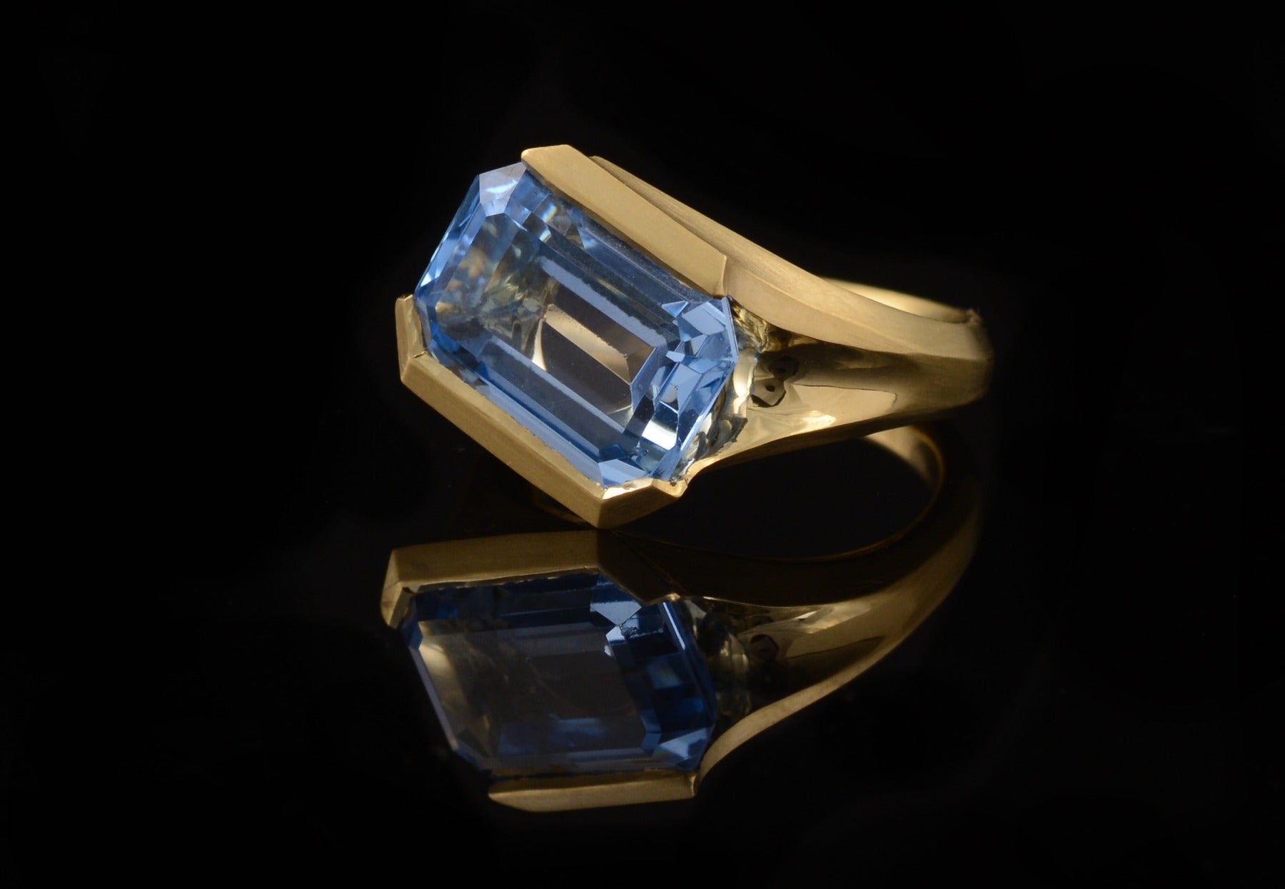 Hand carved gold ring with rectangular stone