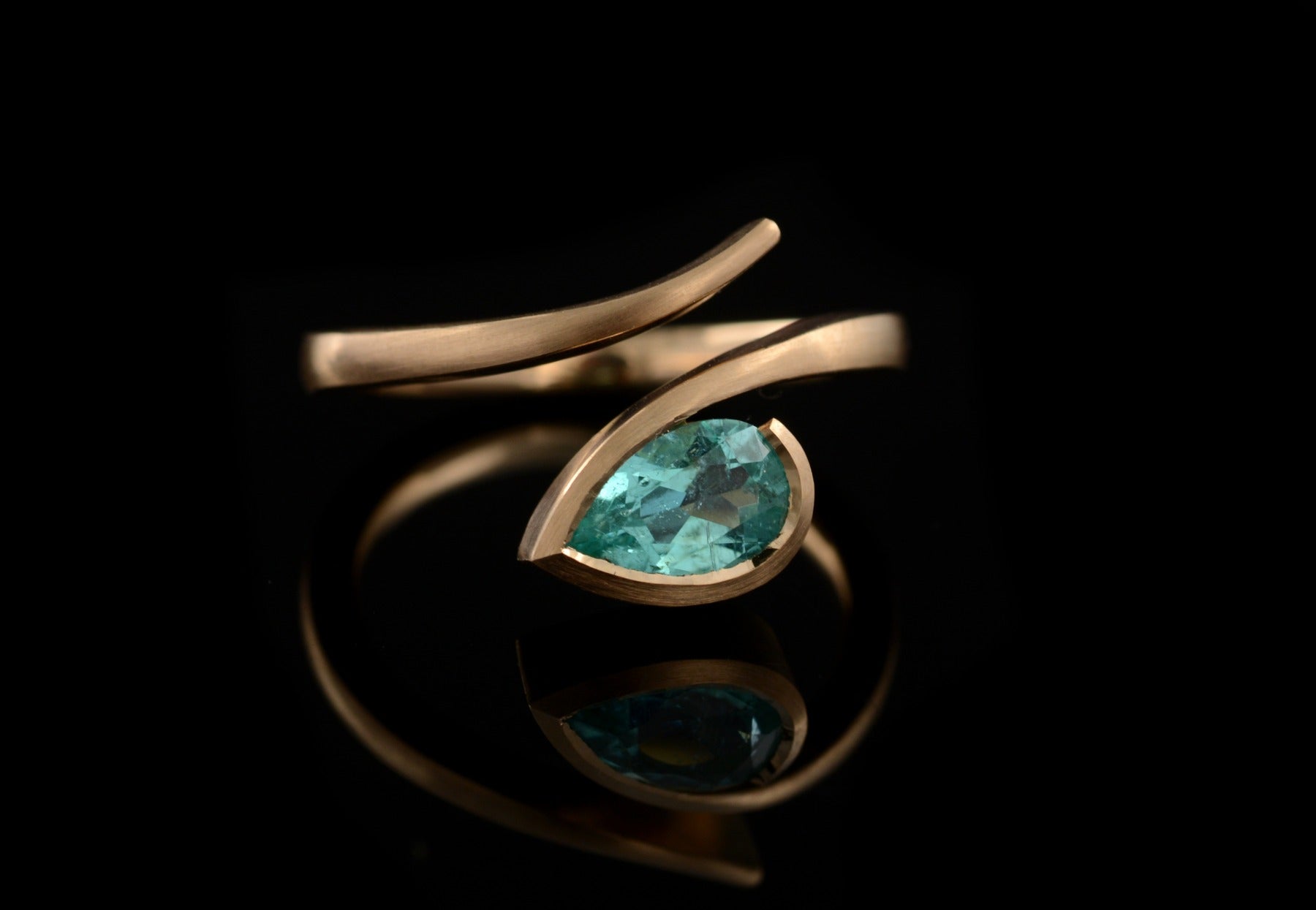 Rose gold and paraiba tourmaline engagement ring