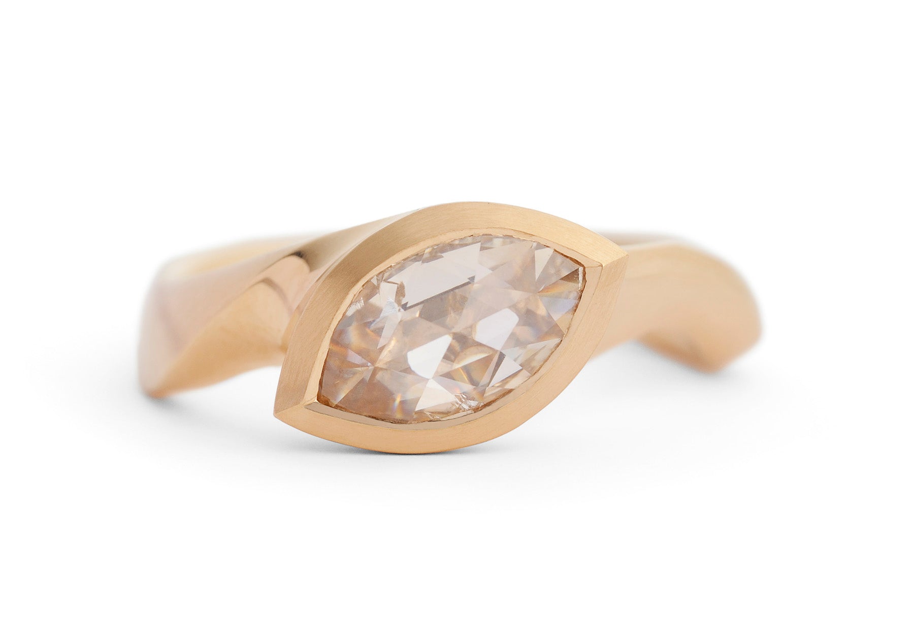 18ct rose gold engagement ring with rose cut marquise diamond